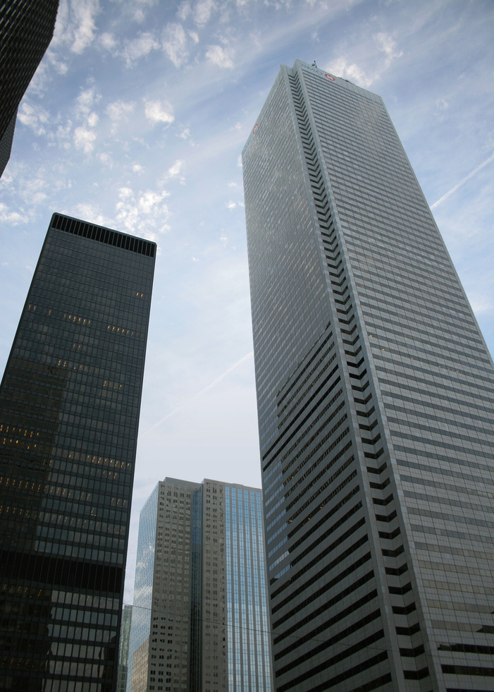 3 Large Building Under White Clouds during Day Time